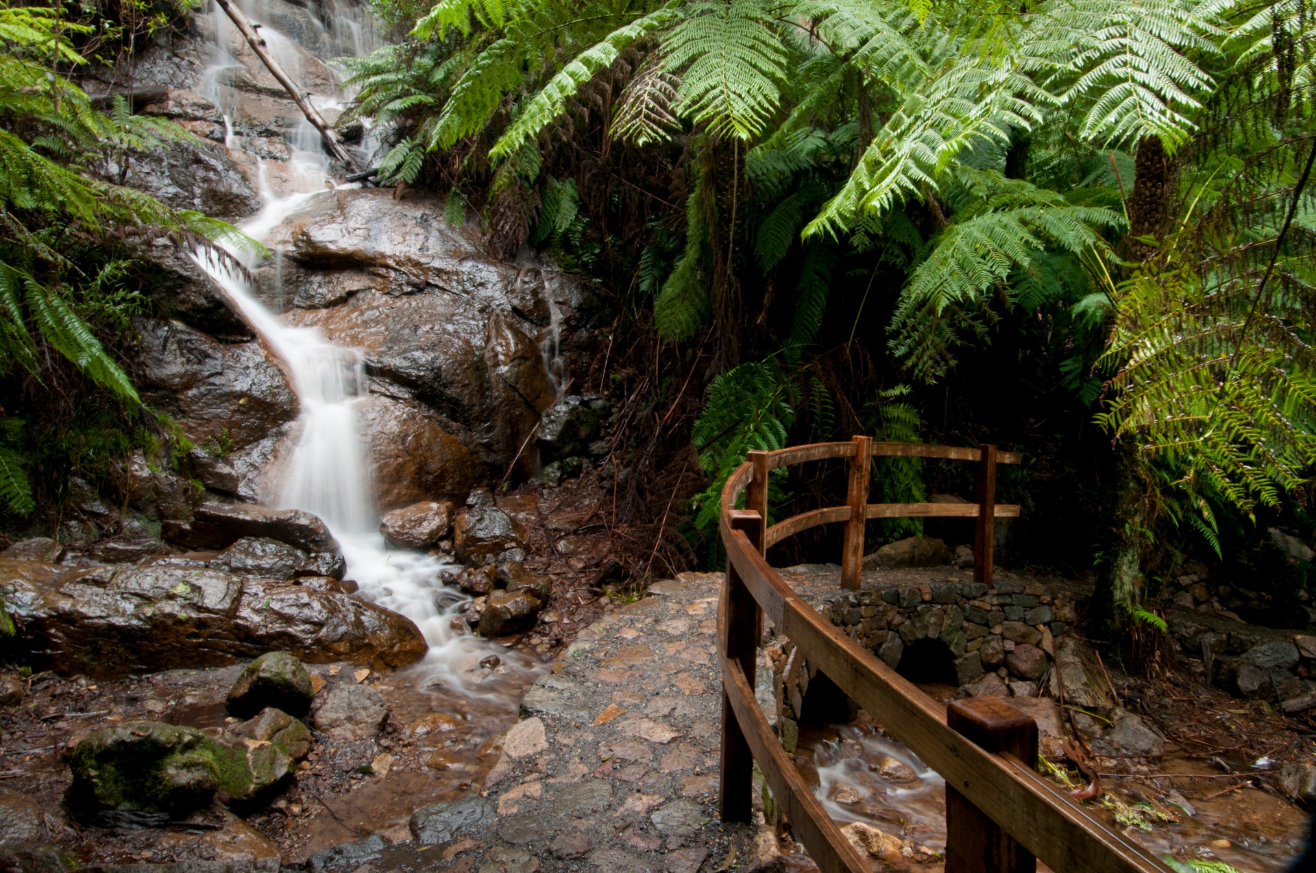 la la falls waterfall next to stone pathway in warburton