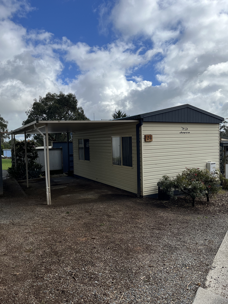 Exterior of 1 bedroom standard cabin Lilydale Pine Hill Caravan Park