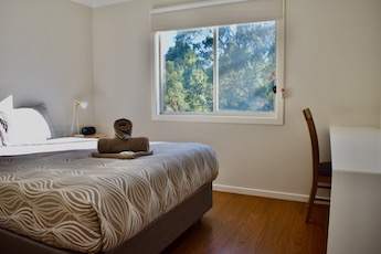 Main bedroom in Studio Cabin at Lilydale Pine Hill